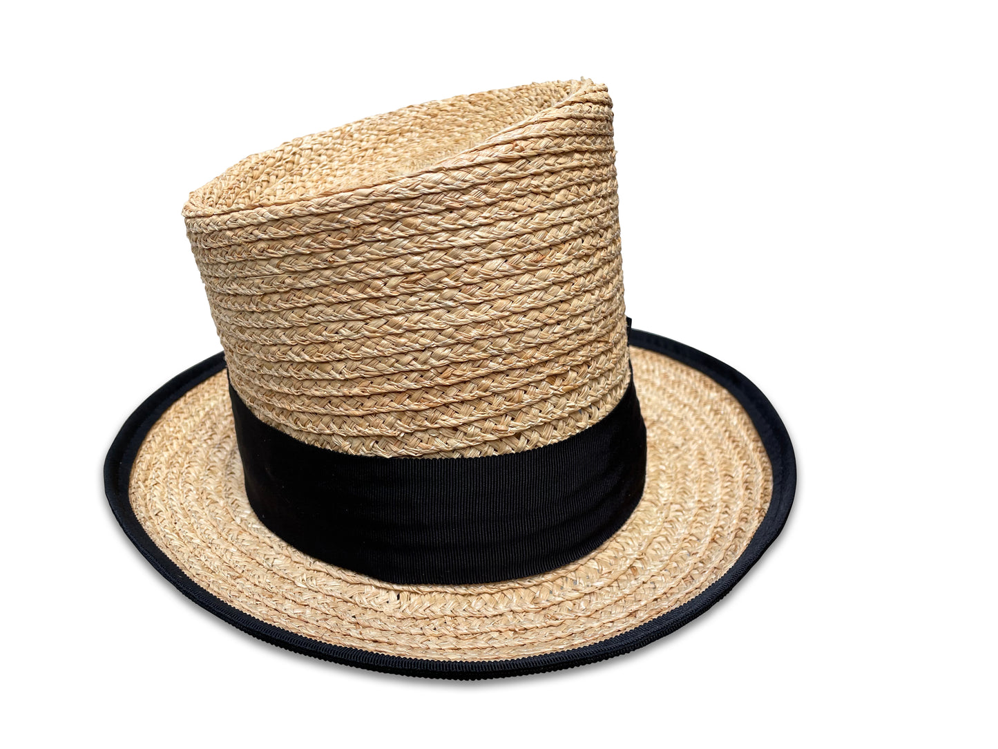 Raffia braid top hat with black grosgrain ribbon trim. Brim features a black ribbon piping. The crown is asymmetrical.