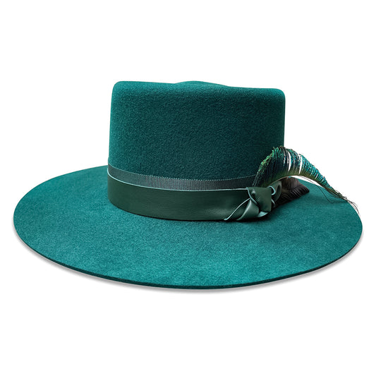 Elegant green 'Amanda' gambler hat with a flat brim, satin liner, and peacock feather accent by Cha Cha's House of Ill Repute.
