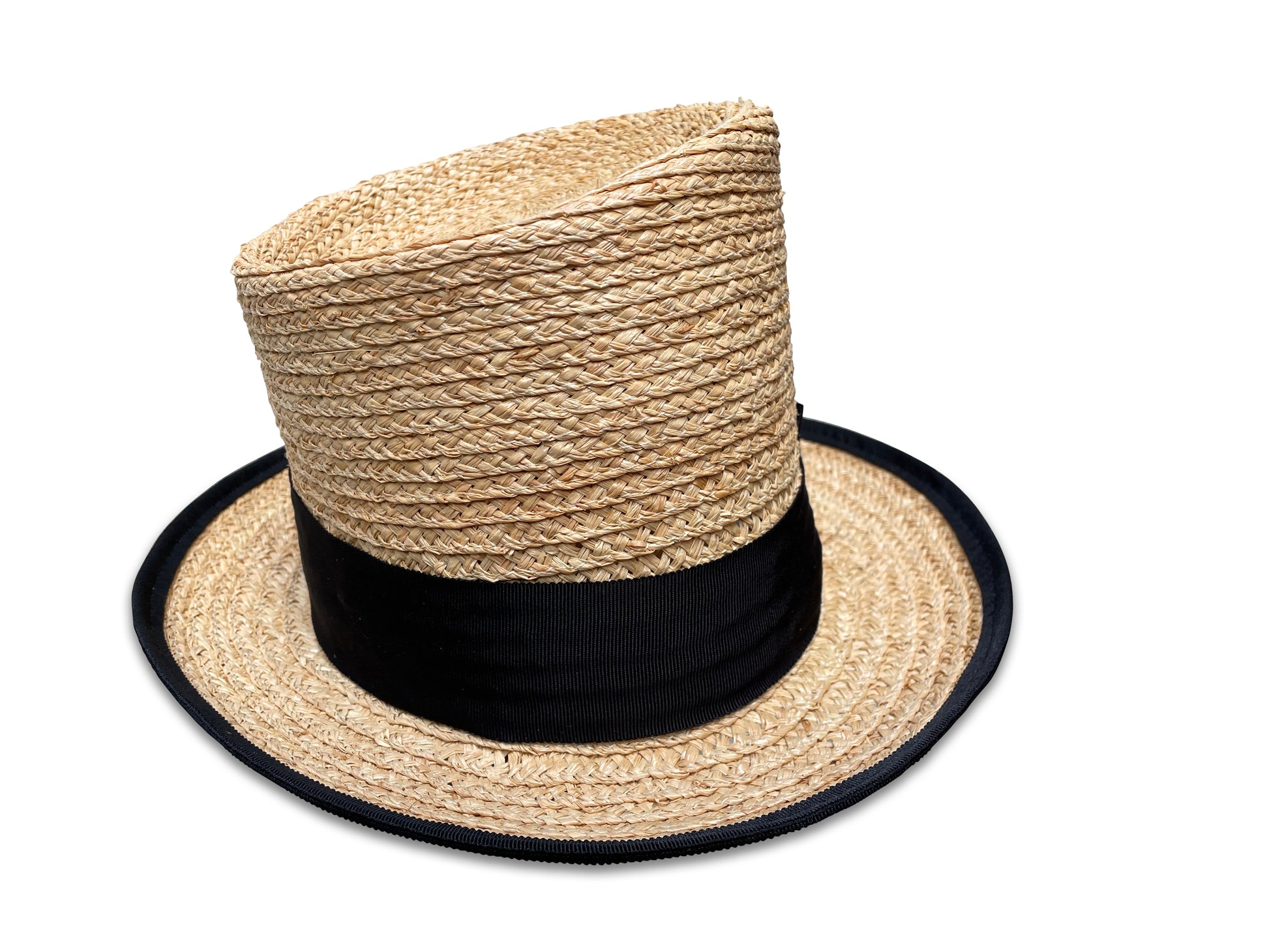 Raffia braid top hat with black grosgrain ribbon trim. Brim features a black ribbon piping. The crown is asymmetrical. 
