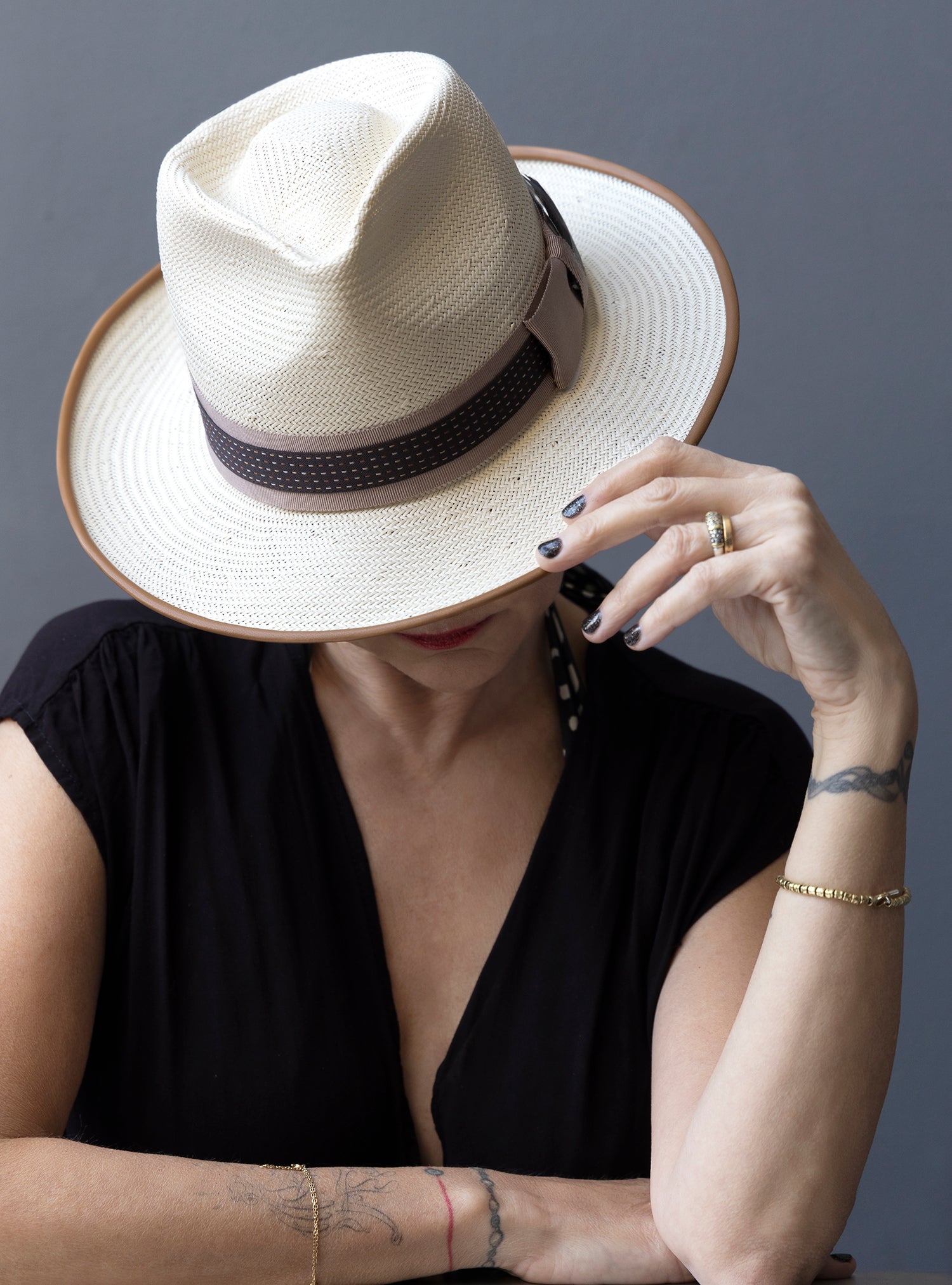 Ivory Straw Teardrop Fedora with polka dot trim on Model