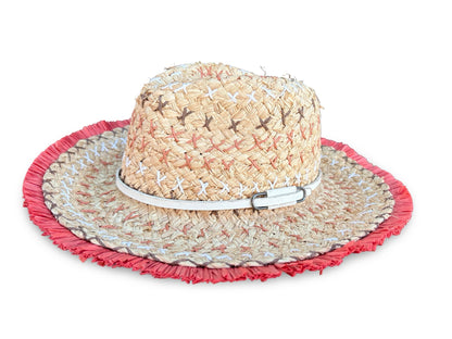 A woven straw sun hat with a wide brim, featuring a red fringed edge, a white band with a silver buckle, and small embroidered details on the crown, shown against a plain white background.