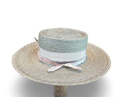 Woven straw hat with a tonal band on a white background - Side View