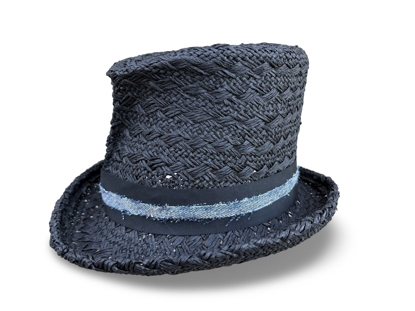 Black straw hat with a recycled denim band on a white background