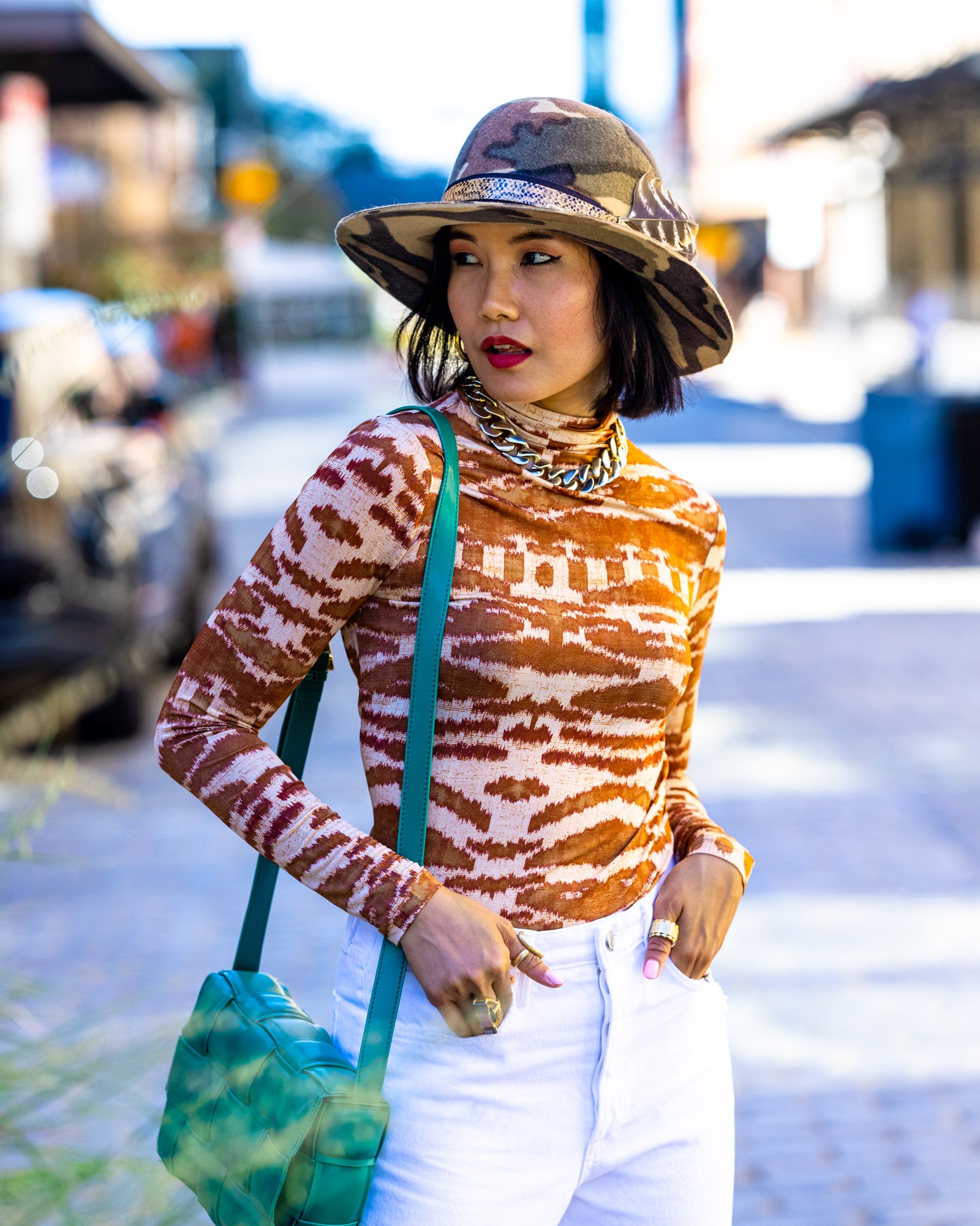 Nanphanita Jacob wearing a hat from Cha Cha's House of Ill Repute, a hat shop for women in NYC