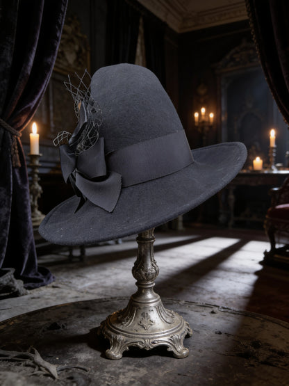 Black Witch hat with black grosgrain bow trim and matching stickpin in Haunted House setting