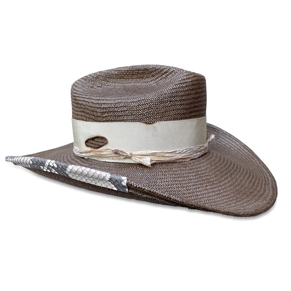 The La Petite Chatte cowboy hat in a rich chocolate hue, featuring a snakeskin band and a distinctive feather detail. Made to order by Cha Cha's House of Ill repute, a woman-owned millinery in New York City
