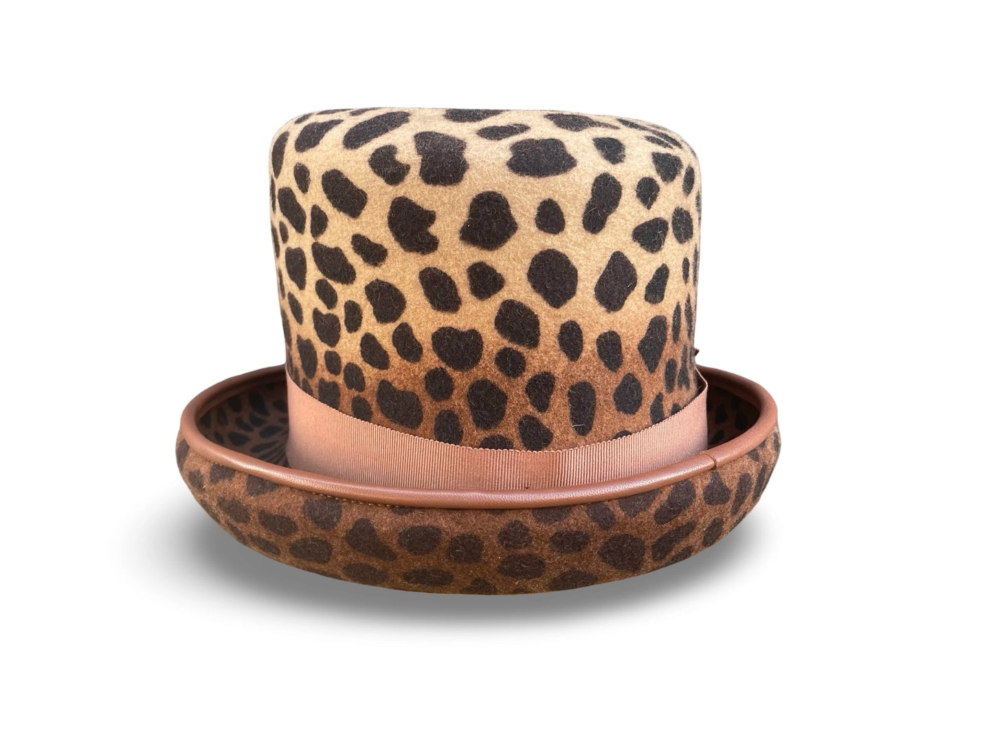 Leopard print top hat with matching piping and ribbon on a white background