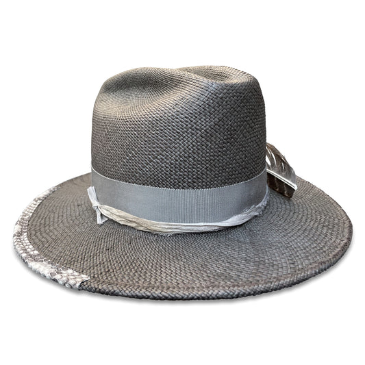 Handcrafted Ursa cowboy hat made from Panama straw, featuring a three-inch brim for sun protection. Made by Cha Cha's house of Ill Repute in New York City.