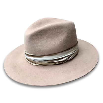 Biege Wool Western Style Fedora with silk trim  and suede cord.  Three inch brim, left side view. 