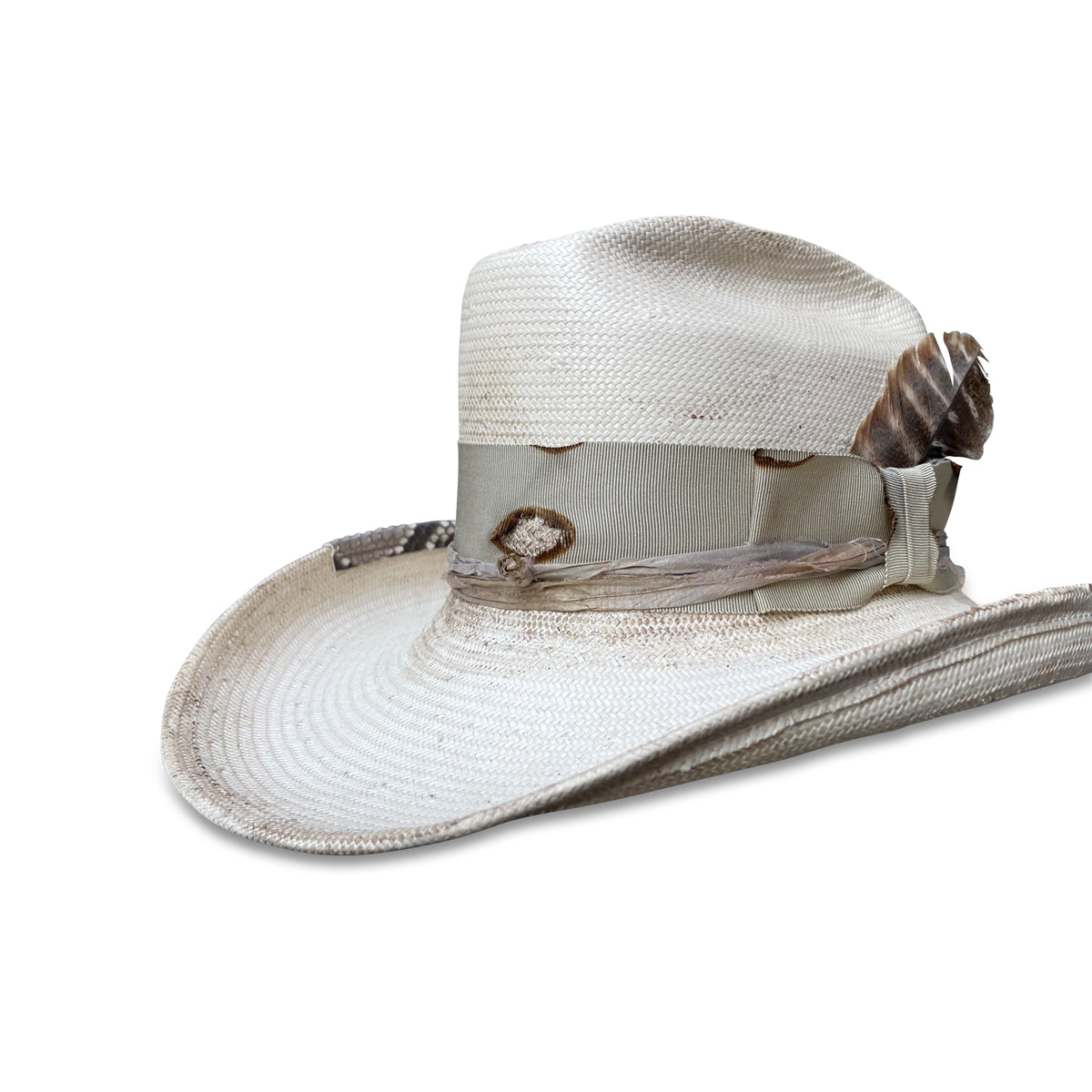Stylish, made-to-order ivory straw cowboy hat with a distressed finish and exotic feather accent by Cha Cha's