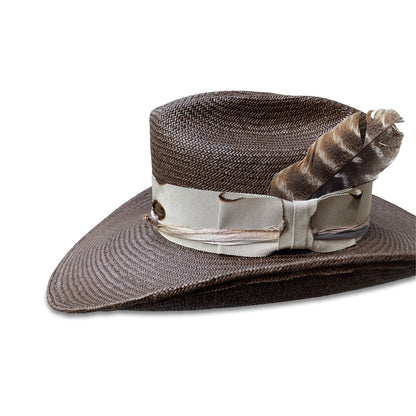 Chocolate brown Shantung straw cowboy hat with a grosgrain ribbon, sari silk, and a turkey feather from Cha Cha's.