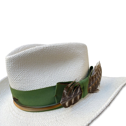 Bespoke cowboy hat with fedora styling, made from panama straw with an adjustable band and sustainable feather trim