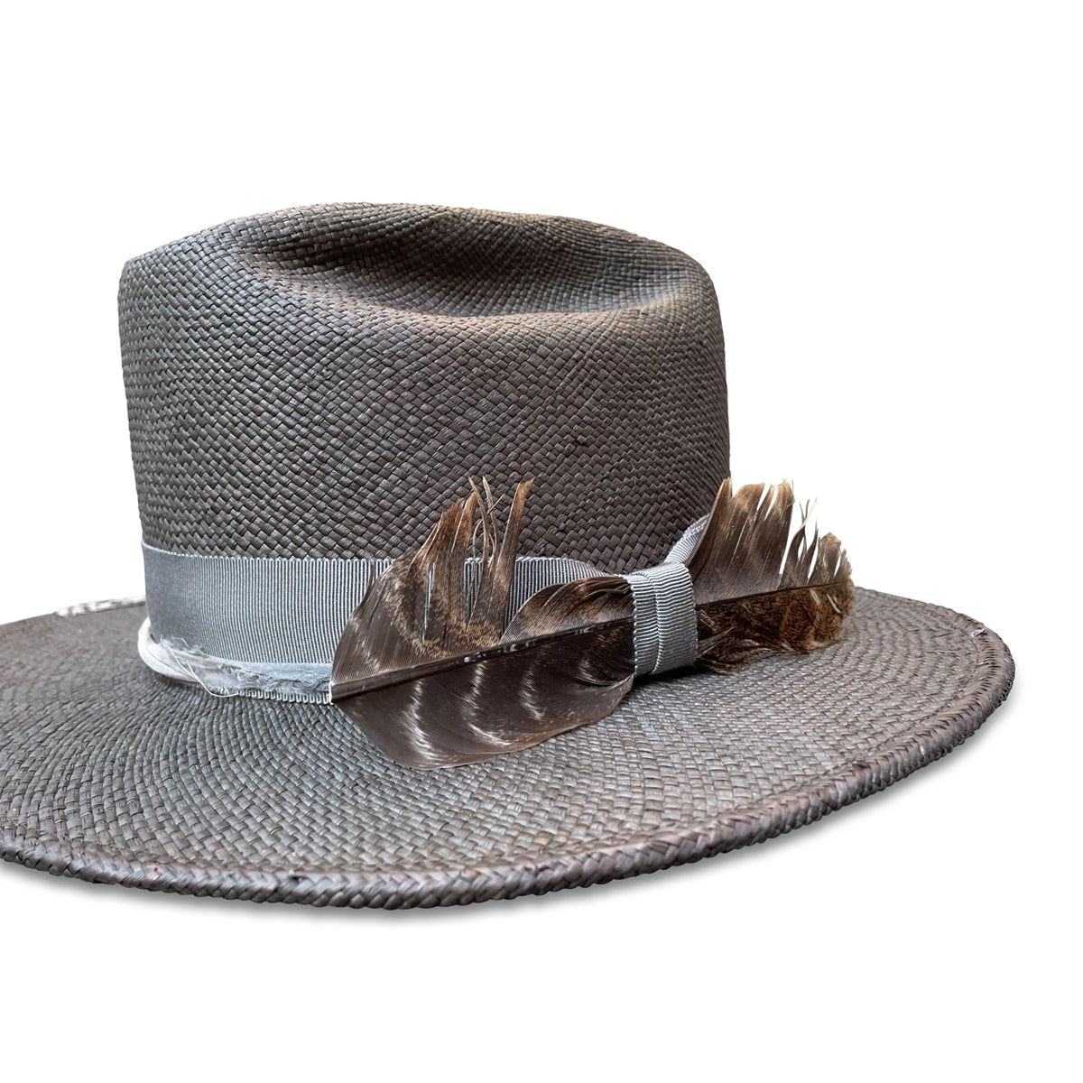 Unique hybrid-style straw cowboy hat with recycled silk and turkey feather detailing, crafted by Cha Cha's House of Ill Repute in NYC