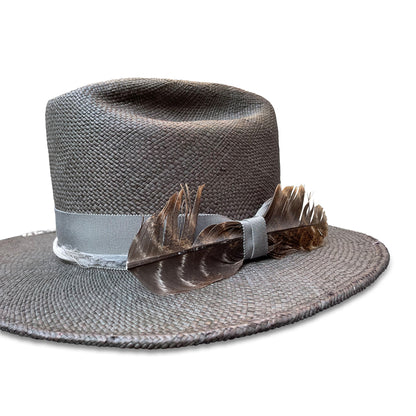 Unique hybrid-style straw cowboy hat with recycled silk and turkey feather detailing, crafted by Cha Cha's House of Ill Repute in NYC